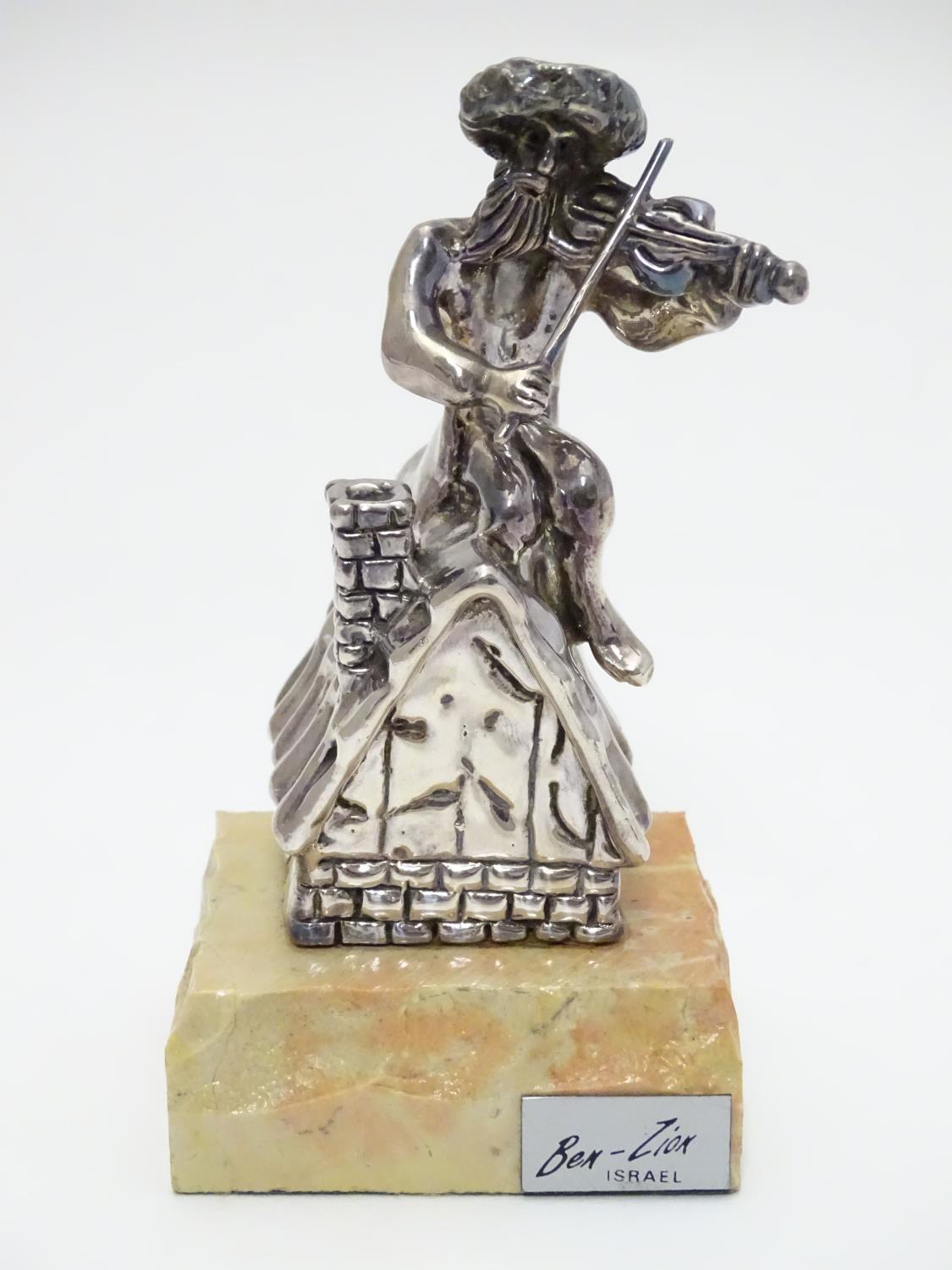 A 925 silver model of a fiddler on a roof mounted on a marble base. Base bears a plaque entitled ? - Image 3 of 6