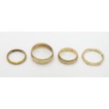 4 Assorted gold rings to include: A 9ct gold band size approx S, A 9ct gold marked 'Fidelity; to