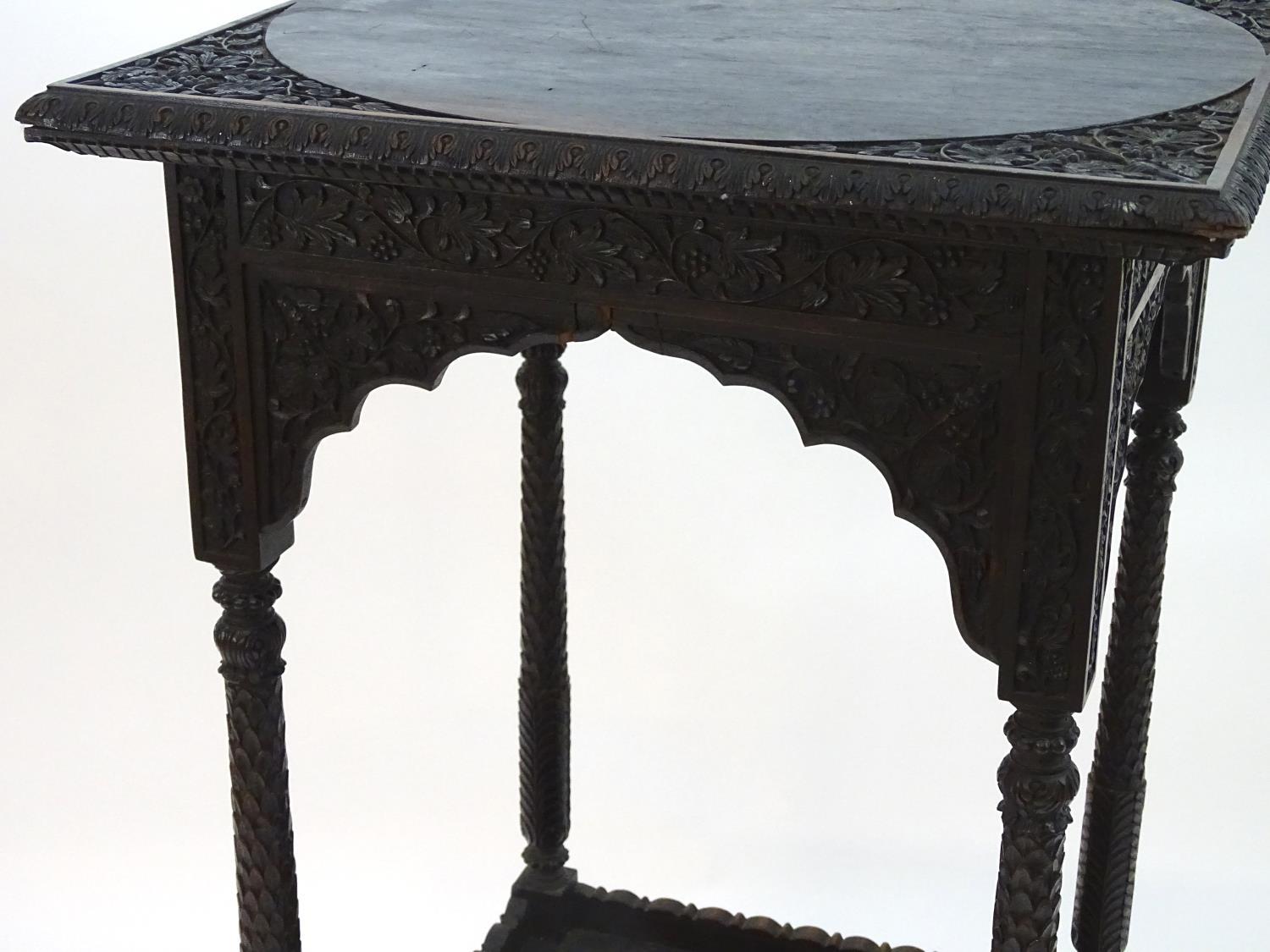 A 19thC rosewood mirror with a pierced and carved top and bottom, depicting anthemion in flower - Image 4 of 8