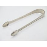 Scottish silver sugar tongs maker Mc. Possibly Matthew Craw / James McKenzie/ John McKenzie. c.1805.