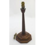 Mid-Century: a carved mahogany table lamp in the manner of Gordon Russell, Cotswold School, with