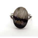 A silver ring set with blue john cabochon. Ring approx J Please Note - we do not make reference to