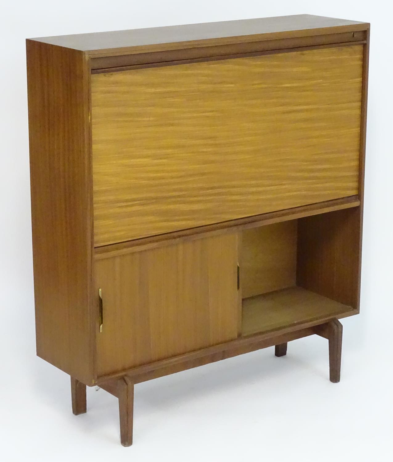 Vintage Retro, Mid-Century: a teak drinks cabinet by Beaver & Tapley Ltd, London, labelled 'Multi-