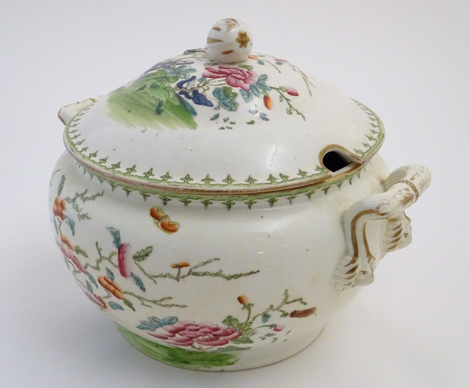 A Chinese tureen and cover with twin handles decorated with a stylised landscape with a tree and - Image 4 of 10