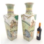 A pair of Chinese square sectional vases with flared rims, decorated with horses in a landscape