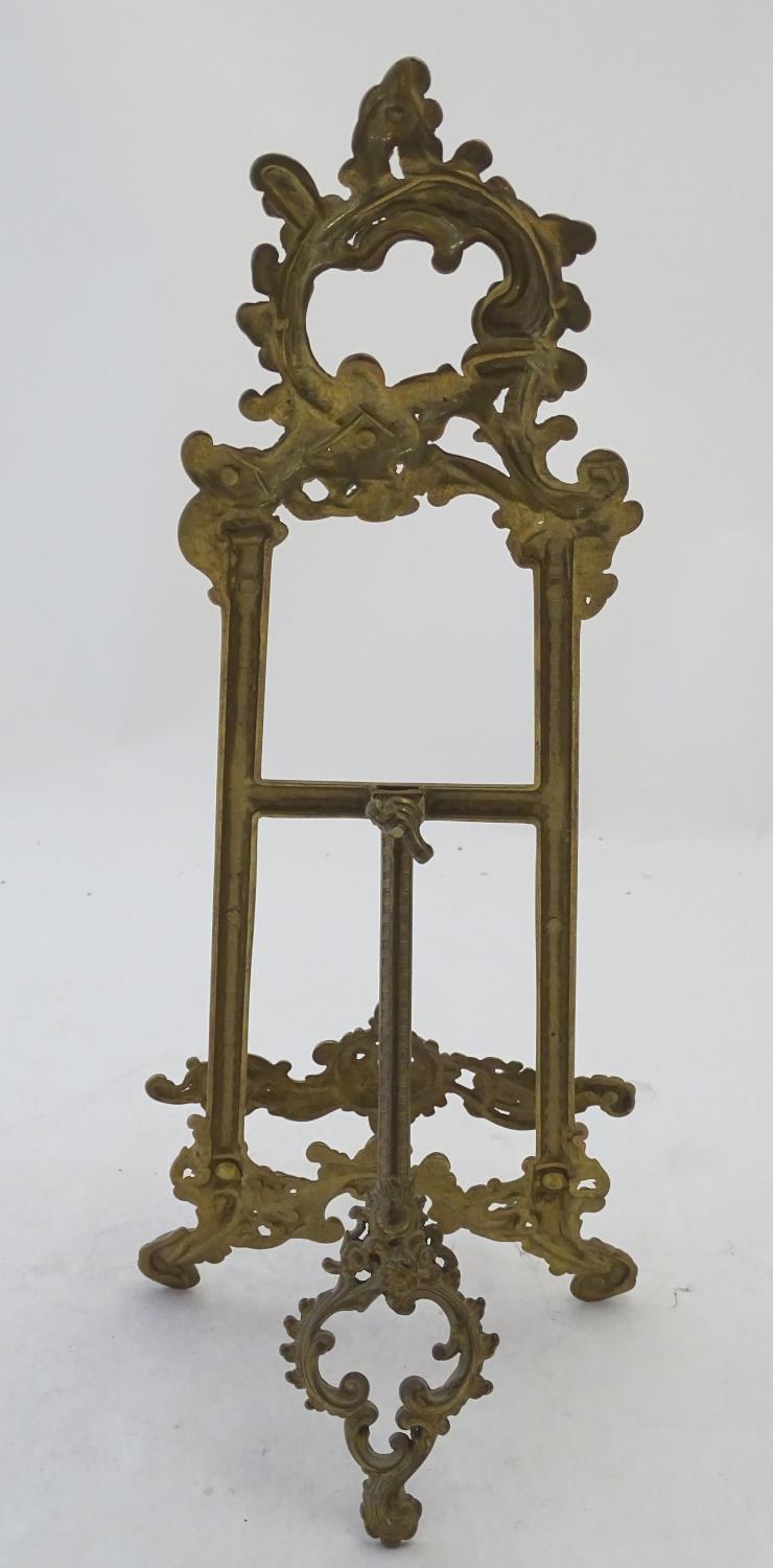 A 20thC cast brass table top easel with scrolling foliate decoration. Approx. 15 1/2" high Please - Image 2 of 6