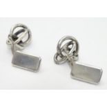 A pair of Continental silver cufflinks Please Note - we do not make reference to the condition of