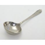 An Art Deco silver preserve spoon hallmarked Sheffield 1922 maker Joseph Elliot & Sons. 4 1/4'' long