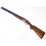 Shotgun: a Bettinsoli 12 bore over and under ejector shotgun, single selective trigger, walnut