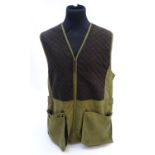 A Laksen olive green skeet vest, size 3XL Please Note - we do not make reference to the condition of