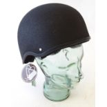 A Champion junior jockey helmet / horse riding hat in black (size 4), with tags Please Note - we