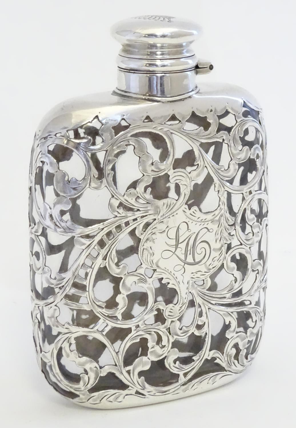 A Victorian hip flask, the glass flask with ornate silver mounts with acanthus scroll detail - Image 3 of 7