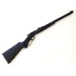 Rimfire rifle: a Marlin '39AS' .22LR lever action rifle, 23 1/4" barrel with tube magazine under,