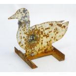 A mid-20thC gallery target formed as a duck, of steel construction with articulated head and body