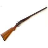 Shotgun: an F. Clarke, Birmingham 12 bore side by side toplever hammergun, c1910, walnut semi-