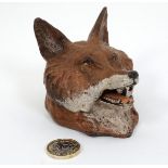 A 21stC novelty cold painted bronze inkwell formed as a fox head. Approx. 3 1/2'' long Please Note -