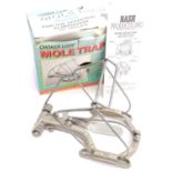 A Nash 'Choker loop' mole trap, of galvanised steel and aluminium construction, boxed with