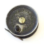 A mid 20thC centrepin salmon fishing fly reel, 4" in diameter Please Note - we do not make reference