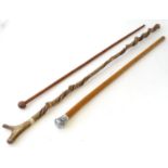 Three assorted sticks, comprising a walking cane with a malacca shaft and white metal pommel with
