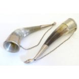 Two bovine horn flasks / vessels with white metal mounts. Approx 9 12" long Please Note - we do
