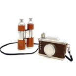 Two novelty hip flasks, one formed as a camera, the other a twin flask formed as binoculars (2)