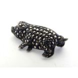 A Vintage white metal brooch formed as a pig set with marcasite detail 1" long Please Note - we do