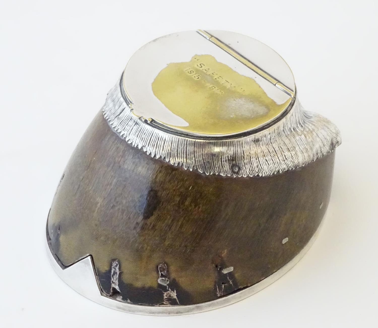 Taxidermy: Rowland Ward, London, an early 20thC horse hoof inkwell, with silver plated mounts (