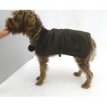 A Barbour dog wax jacket / coat, size L A Barbour dog wax jacket / coat, size L