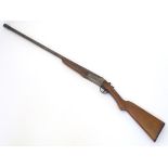 Shotgun: a Webley & Scott, Birmingham 12 bore semi-hammerless single barrel shotgun, beech semi