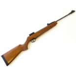 Airgun: a Remington 'Express' .22 break barrel air rifle, with beech (chequered) pistolgrip stock,