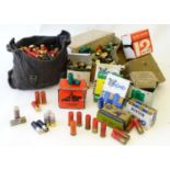 A large assortment of 12 bore shotgun cartridges, including a box of 'Vinnie Jones' 30g #6, a bag