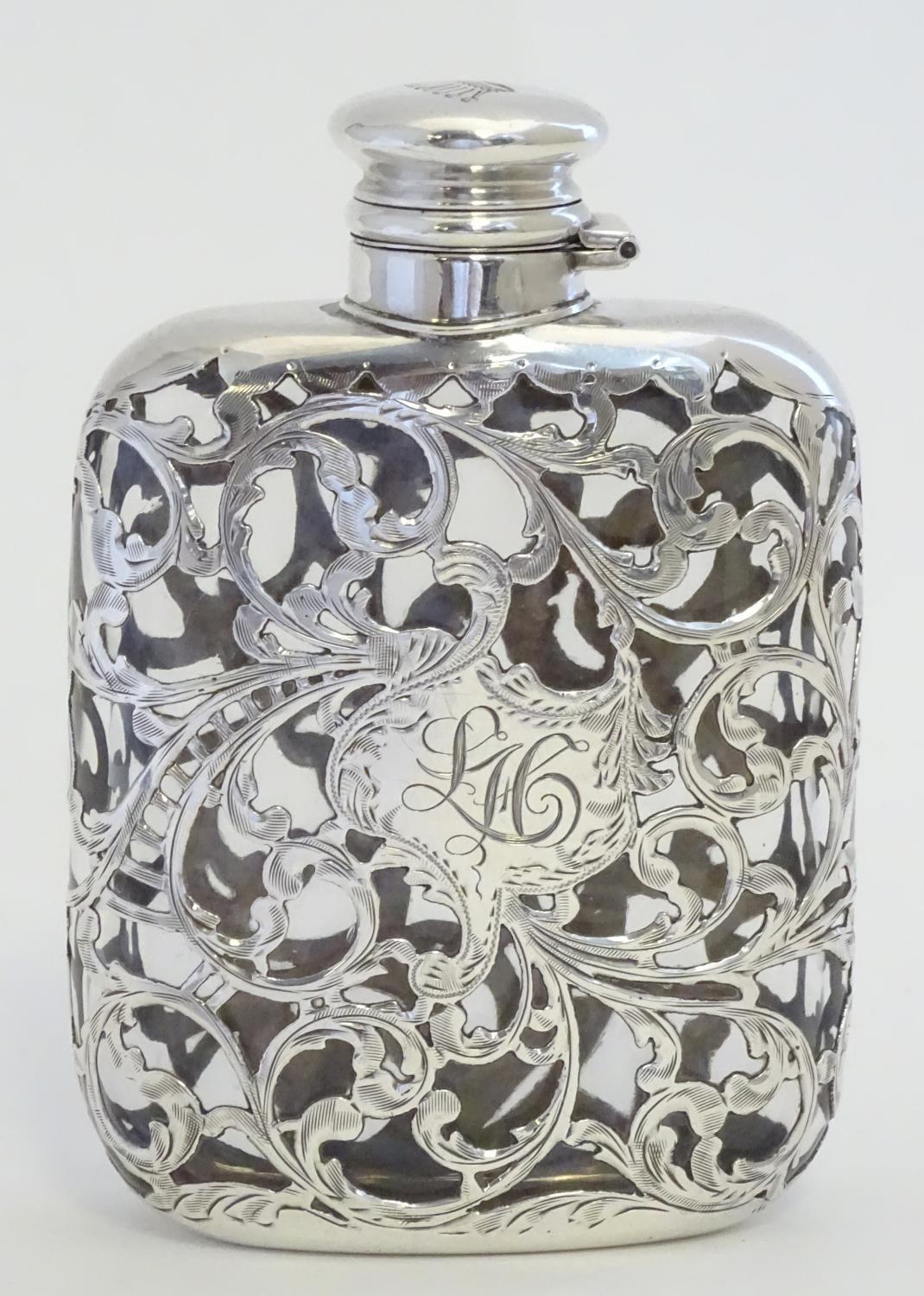 A Victorian hip flask, the glass flask with ornate silver mounts with acanthus scroll detail - Image 2 of 7