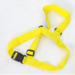 A reflective yellow belt Please Note - we do not make reference to the condition of lots within