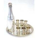 A French novelty cocktail / tot set, the shaker formed as a bottle, the 6 shot / tot cups formed