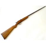 Shotgun: a Webley and Scott, Birmingham .410 bolt action shotgun, beech semi-pistolgrip stock, 25