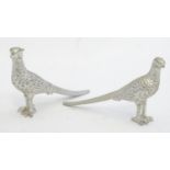 A pair of silver plate models of pheasants. Approx 1 3/4" high Please Note - we do not make