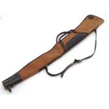 Shooting: A Brady-type canvas and leather gunslip with wool lining, having shoulder strap and