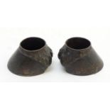 A pair of cast novelty horse hoof formed table salts. Approx. 1 1/2" high (2) Please Note - we do