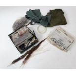 Fishing: A quantity of assorted fly tying equipment, to include feathers, vice, cottons, hooks, line