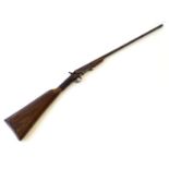 Shotgun: a Belgian folding single barrel .410 sidelever hammergun, walnut straight hand stock with