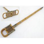 A 19thC French shooting stick, bamboo, with folding seat forming the handle, marked 'Bte. S.G.D.