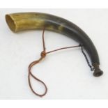 A Continental hunting horn, bovine with brass mouthpiece and leather landyard, 13" long Please