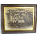 A Victorian black and white photograph of a young boy on horseback. Signed lower right A.