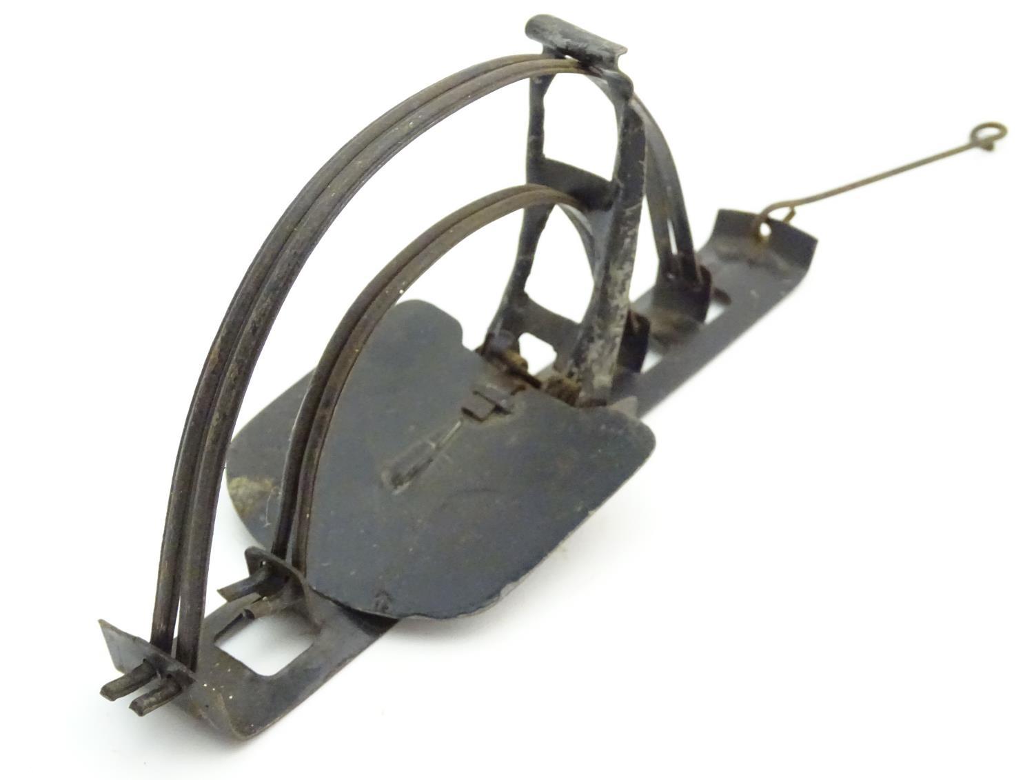 Antique trap: a mid-20thC tin pole rat trap, 9" long Please Note - we do not make reference to the - Image 4 of 4