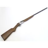 Shotgun: a Lincoln 20 bore lever-cocking folding single barrel shotgun, beech semi-pistolgrip