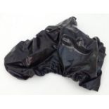 A waterproof horse riding / equestrian ride on saddle cover, full size in black. Please Note - we do