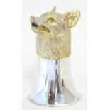 An Irish silver fox head stirrup cup, the fox head with gilt decoration. Hallmarked Dublin 1999