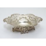 A Victorian silver bon bon dish with embossed and pierced decoration hallmarked Birmingham 1893. 5