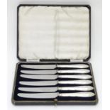 A cased set of six silver handled tea knives. Hallmarked Sheffield 1946 maker Harrison Brothers &
