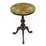Taxidermy: manner of Rowland Ward, a Victorian hide topped circular occasional table, with turned